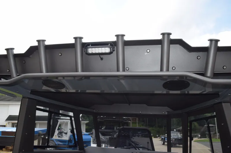 Slide: The Image of 2026 Stabicraft 2050 Supercab Sportfish roof with rod holders and LED light. - 17