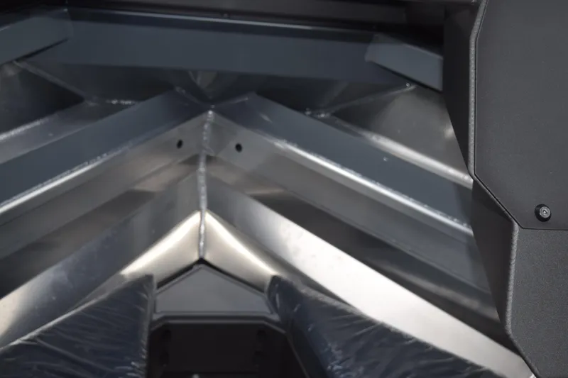 Slide: The Image of Interior view of 2026 Stabicraft 2050 Supercab Sportfish boat, showcasing sleek metal design. - 20