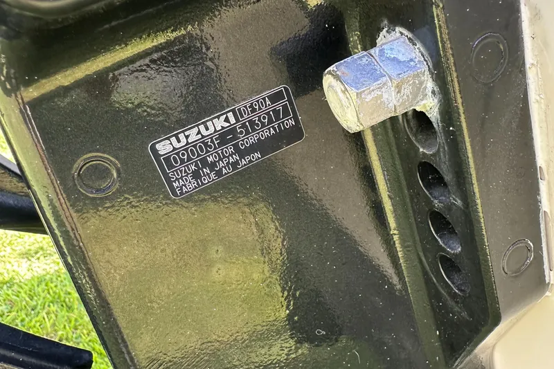 Slide: The Image of Close-up of Suzuki DF90A motor label on a 1996 Grady-White Spirit 175 boat. - 7