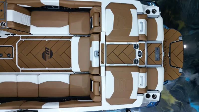 Slide: The Image of 2022 Malibu Wakesetter 25 LSV interior with brown and white seating, top view. - 18