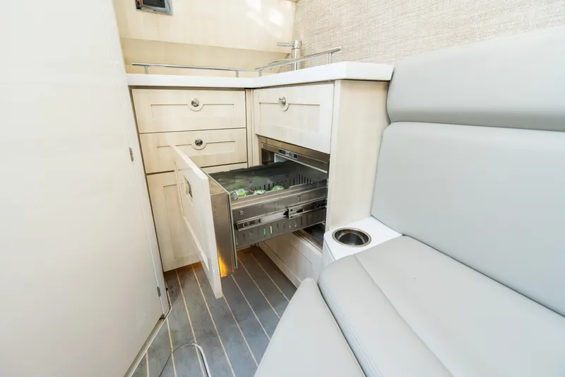 Slide: The Image of 2023 HCB 42 Lujo interior with open drawer, modern cabinetry, and cushioned seating. - 29