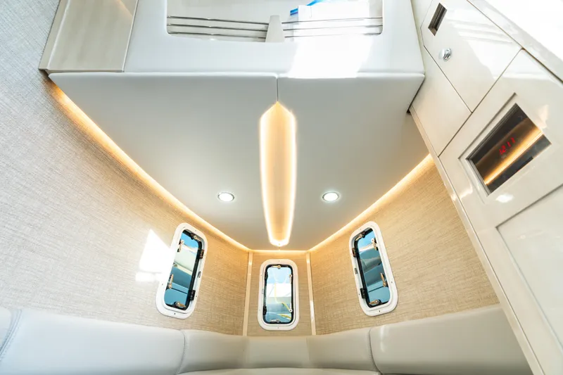 Slide: The Image of Luxurious interior of 2023 HCB 42 Lujo boat with modern lighting and sleek design. - 34