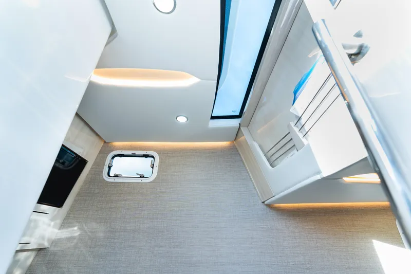 Slide: The Image of Interior of 2023 HCB 42 Lujo boat, featuring modern design and sleek lighting. - 40