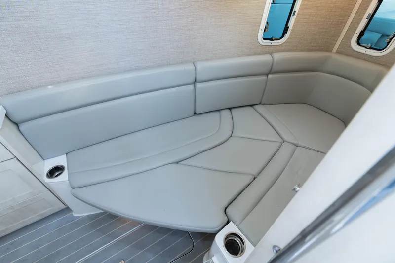 Slide: The Image of Luxurious interior seating of 2023 HCB 42 Lujo boat with gray upholstery. - 41
