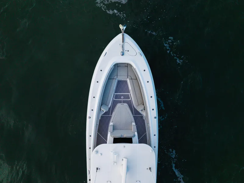 Slide: The Image of Aerial view of 2023 HCB 42 Lujo boat on dark water. - 45