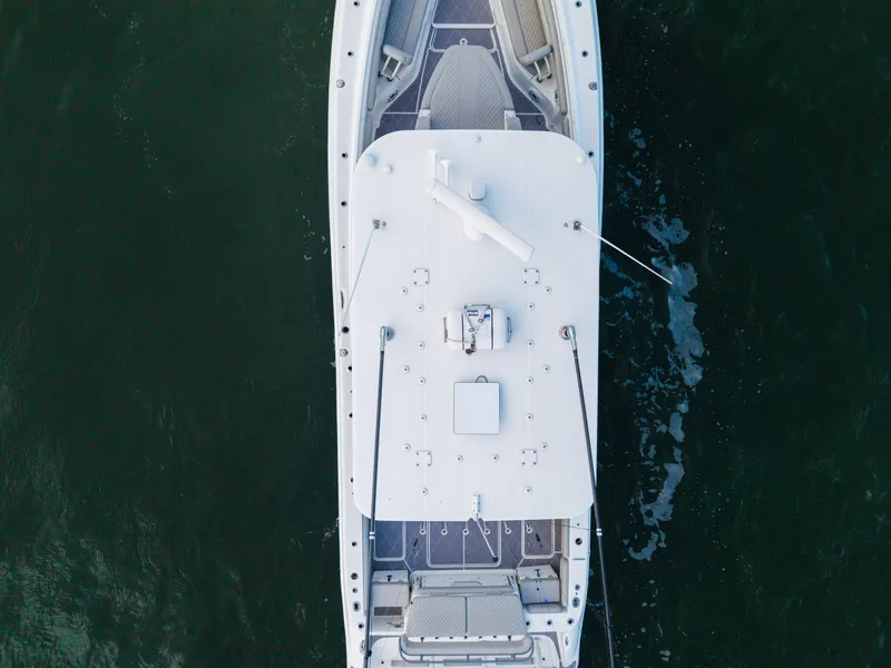 Slide: The Image of Aerial view of 2023 HCB 42 Lujo boat on water. - 46