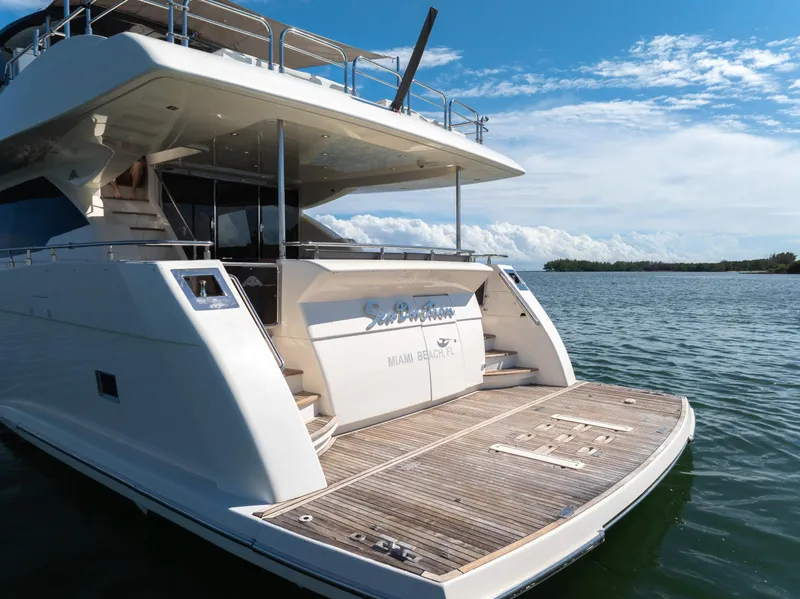 Slide: The Image of Luxury Astondoa 80 GLX yacht, 2016 model, docked on serene water. - 20