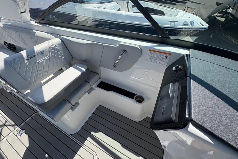 Slide: The Image of 2026 Sea Ray SDX 270 Outboard boat interior with sleek seating and modern design. - 8