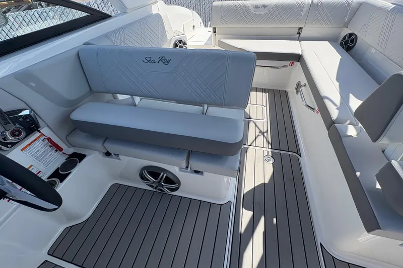 Slide: The Image of 2026 Sea Ray SDX 270 Outboard interior with sleek seating and modern design. - 9
