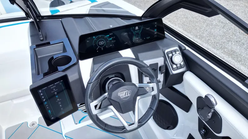 Slide: The Image of 2025 Malibu Wakesetter 23 LSV dashboard with modern controls and digital displays. - 8