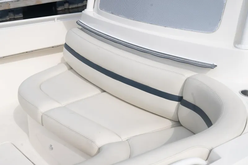 Slide: The Image of 2019 Hunt Yachts 32 Center Console, white cushioned seating with blue accent stripe. - 27