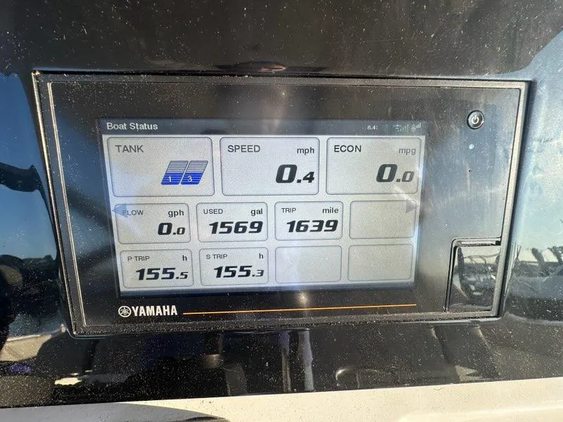 Slide: The Image of Dashboard display of a 2022 Pursuit S 328 Sport boat showing speed, fuel, and trip data. - 8