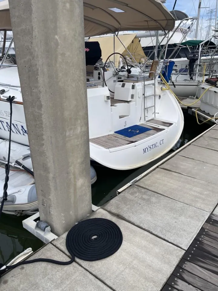 Slide: The Image of Beneteau Oceanis 523 sailboat docked in Mystic, CT, 2006 model. - 20