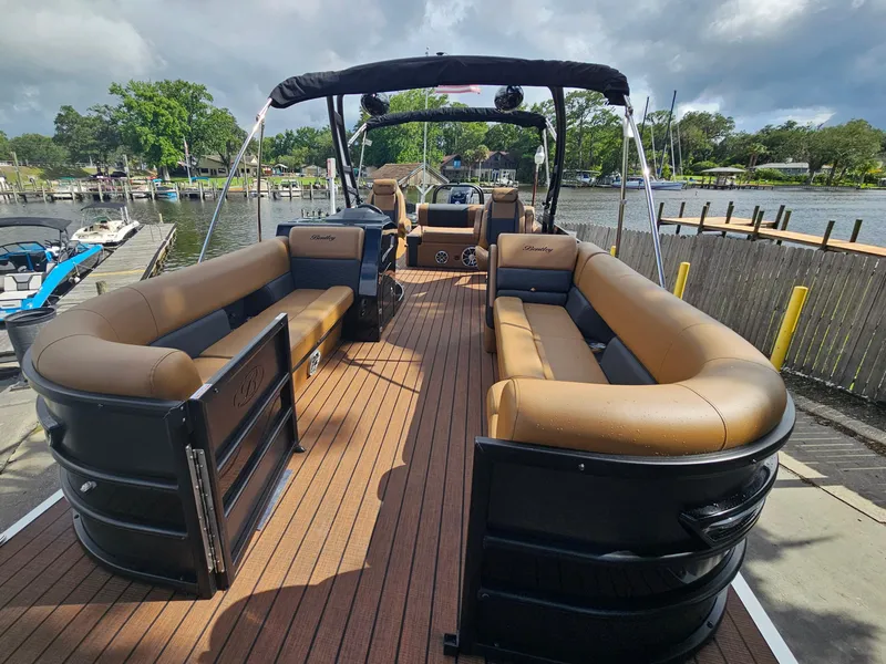 Slide: The Image of Top view of 2025 Bentley Pontoons Elite 253 Swingback layout, featuring spacious seating. - 1