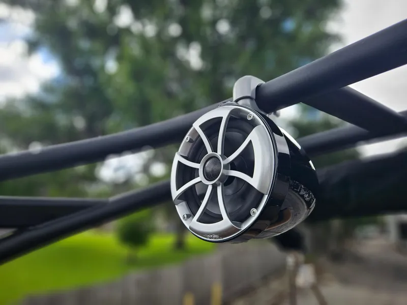 Slide: The Image of Close-up of a speaker on a 2026 Bentley Pontoons Elite 253 Swingback boat. - 27