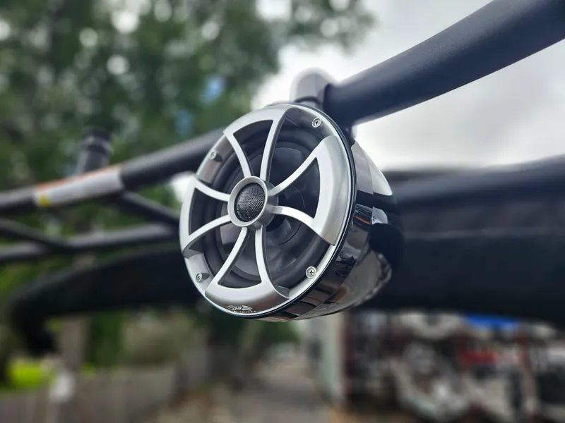 Slide: The Image of Close-up of a speaker on a 2026 Bentley Pontoons Elite 253 Swingback boat. - 28