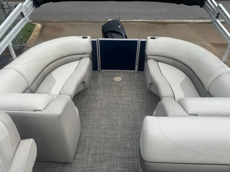Slide: The Image of 2022 Cypress Cay Seabreeze 232 pontoon boat interior with gray seating and flooring. - 5