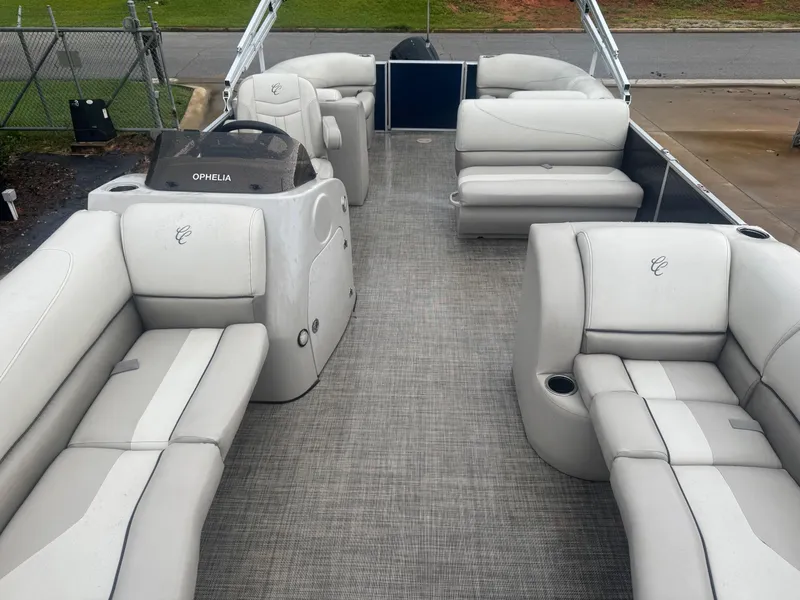 Slide: The Image of 2022 Cypress Cay Seabreeze 232 pontoon boat with spacious seating and modern design. - 7