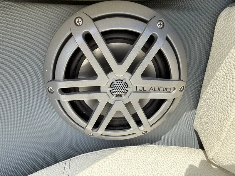 Slide: The Image of JL Audio speaker in 2019 Cobalt CS23 boat interior. - 16