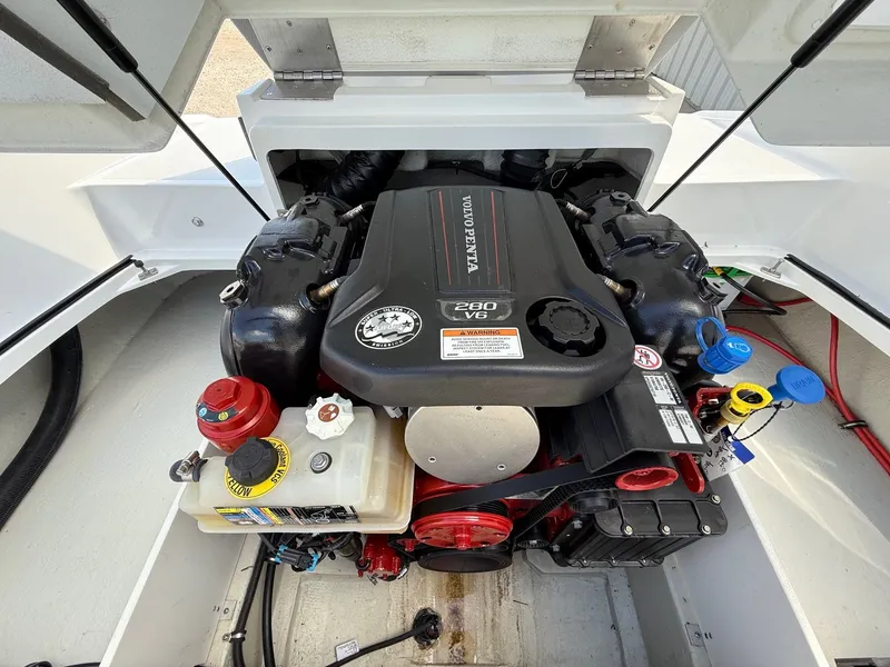 Slide: The Image of 2019 Cobalt CS23 boat engine compartment with Volvo Penta 280 V6 engine. - 34