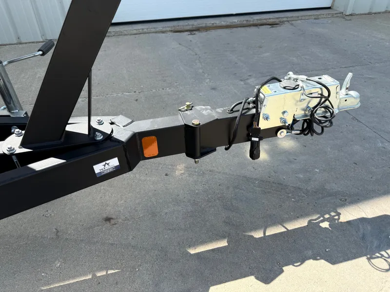 Slide: The Image of Trailer hitch of a 2019 Cobalt CS23 boat on concrete surface. - 43