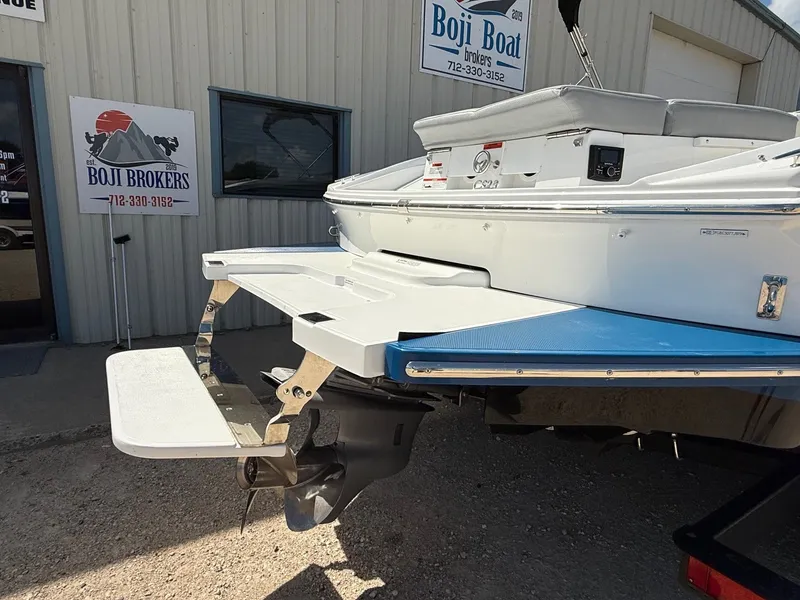 Slide: The Image of 2019 Cobalt CS23 boat rear view with swim platform at Boji Boat Brokers. - 9