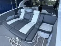 Slide: The Image of 2022 Cruisers 42 GLS boat interior with luxurious seating and modern design. - 10