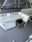 Slide: The Image of 2022 Cruisers 42 GLS yacht interior with sleek kitchen and modern cabinetry. - 16