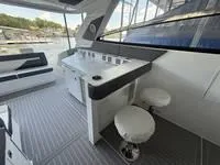 Slide: The Image of 2022 Cruisers 42 GLS yacht interior with modern seating and sleek design. - 24