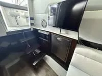Slide: The Image of 2022 Cruisers 42 GLS yacht interior with modern amenities and sleek design. - 26
