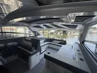 Slide: The Image of 2022 Cruisers 42 GLS yacht interior with modern seating and sleek design. - 35
