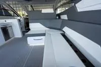 Slide: The Image of 2022 Cruisers 42 GLS yacht interior with sleek seating and modern design. - 44