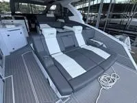 Slide: The Image of 2022 Cruisers 42 GLS yacht with luxurious seating and modern design. - 9