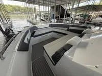 Slide: The Image of Twin engines in a 2022 Cruisers 42 GLS boat, showcasing powerful V8 performance. - 32