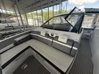 Slide: The Image of 2022 Cruisers 42 GLS swim platform on calm water. - 34