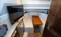 Slide: The Image of 2022 Cruisers 42 GLS luxury boat interior with sleek seating and modern design. - 40