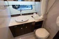 Slide: The Image of 2022 Cruisers 42 GLS boat interior with sleek seating and modern design. - 41