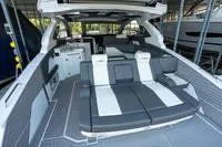 Slide: The Image of Interior of 2022 Cruisers 42 GLS yacht with modern helm and seating area. - 45