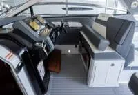 Slide: The Image of 2022 Cruisers 42 GLS boat side view with model name displayed. - 52