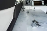 Slide: The Image of 2022 Cruisers 42 GLS boat docked in a marina, front view. - 55