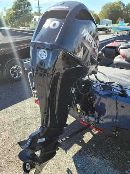 Slide: The Image of 2021 Ranger VS1660T boat with Mercury 40 outboard motor in a sunny outdoor setting. - 3