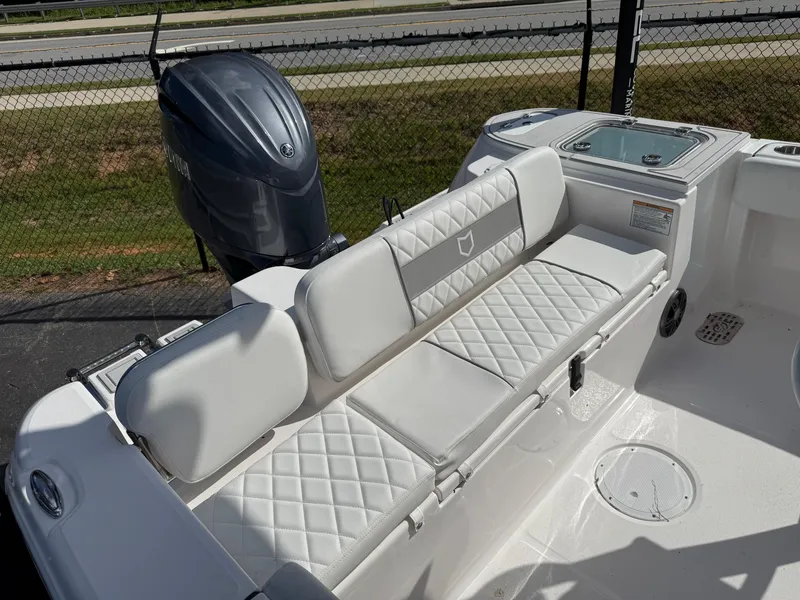 Slide: The Image of 2026 Sea Fox 228 Commander boat with white seating and Yamaha outboard motor. - 4