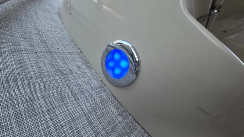 Slide: The Image of Blue LED light on 2017 Premier 240 SunSation boat interior. - 25