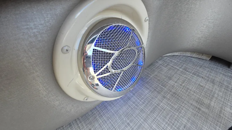 Slide: The Image of Speaker with blue LED lights on 2017 Premier 240 SunSation boat interior. - 28