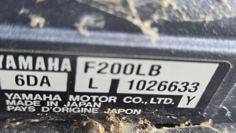 Slide: The Image of Close-up of Yamaha motor label, model F200LB, made in Japan, on a 2017 Premier 240 SunSation. - 34