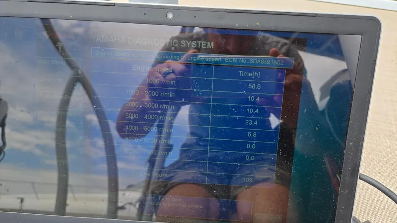 Slide: The Image of Laptop displaying Yamaha diagnostic system data for Premier 240 SunSation, 2017 model. - 37