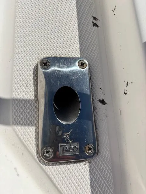 Slide: The Image of Close-up of a metal fitting on a 1997 Wellcraft 210 Coastal boat. - 19