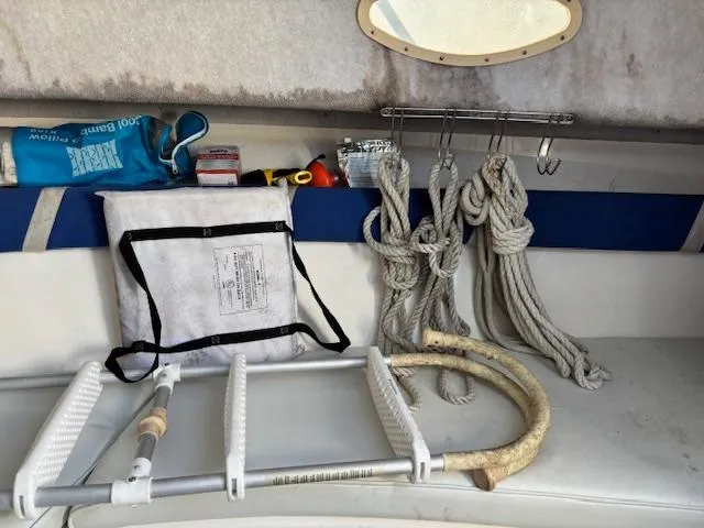 Slide: The Image of Interior of a 1997 Wellcraft 210 Coastal boat with ropes and equipment. - 33