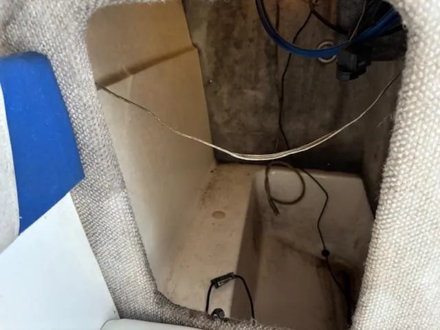 Slide: The Image of Interior view of a 1997 Wellcraft 210 Coastal boat compartment. - 39