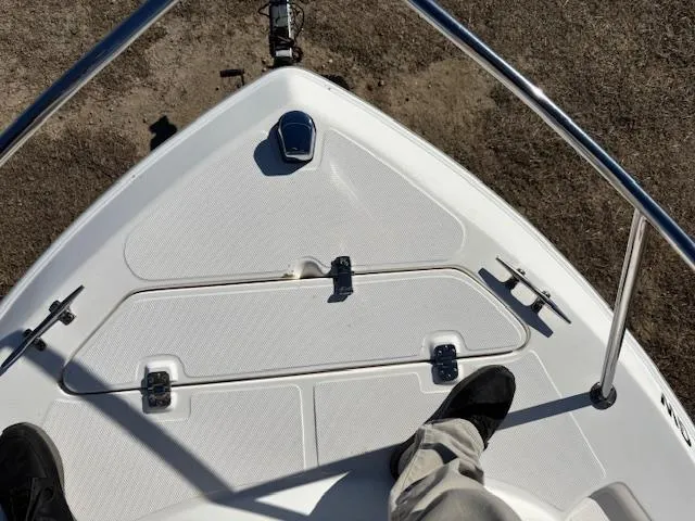 Slide: The Image of Bow of 1997 Wellcraft 210 Coastal boat with stainless steel railings. - 41